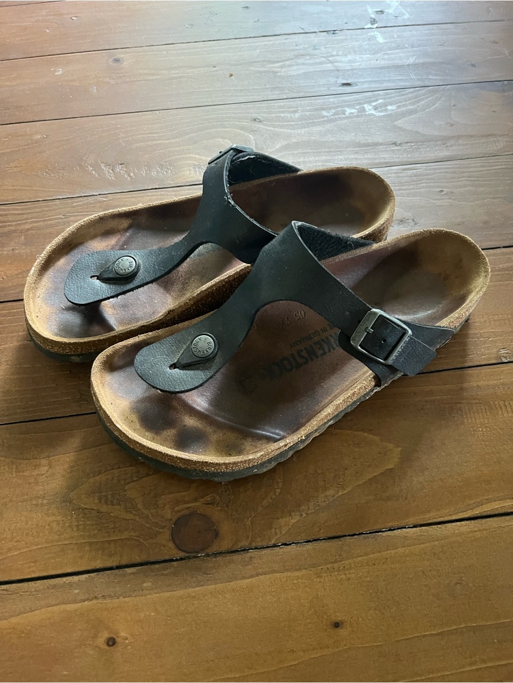 Women’s Black Leather Thong Sandals with Adjustable Buckle